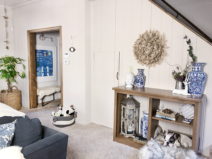 Living room entryway-closet under the stairs