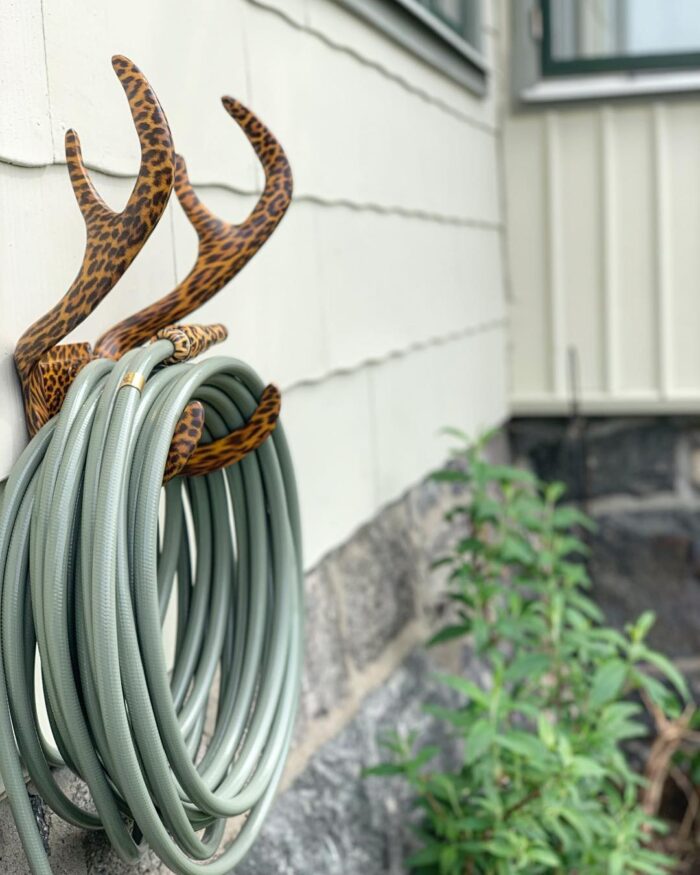 chic garden supplies - pretty garden hose with antlers hose wall mount and cobra nozzle