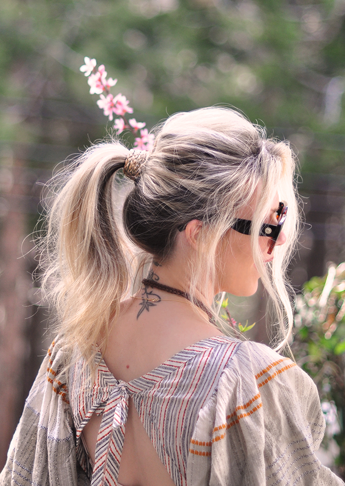 how to wrap your ponytail base with braids to disguise your hair ties