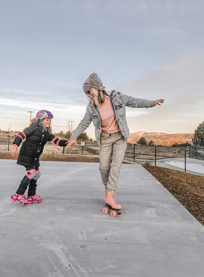 teaching kids to roller skate on valentine's day in lake arrowhead at sunset