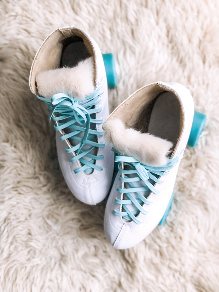 retro white skates with fur tongue-aqua laces and teal wheels