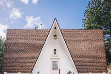 the little apple a-frame in lake arrowhead running springs white a-frame cabin with pink door for sale california