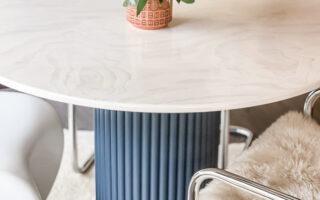 DIY round dining table with contrasting dowel rippled base