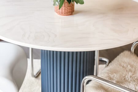 DIY round dining table with contrasting dowel rippled base