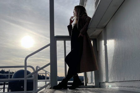 HERO-SUNSET-winter coat by the lake-dockside at the lake arrowhead marina