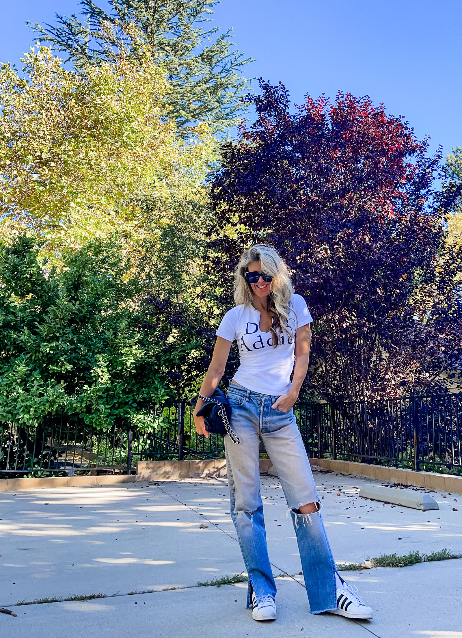 casual fall style, vintage DIOR t-shirt, Dior addict shirt, vintage Levi's, Levis jeans, Adidas superstars, retro 90s y2k fit