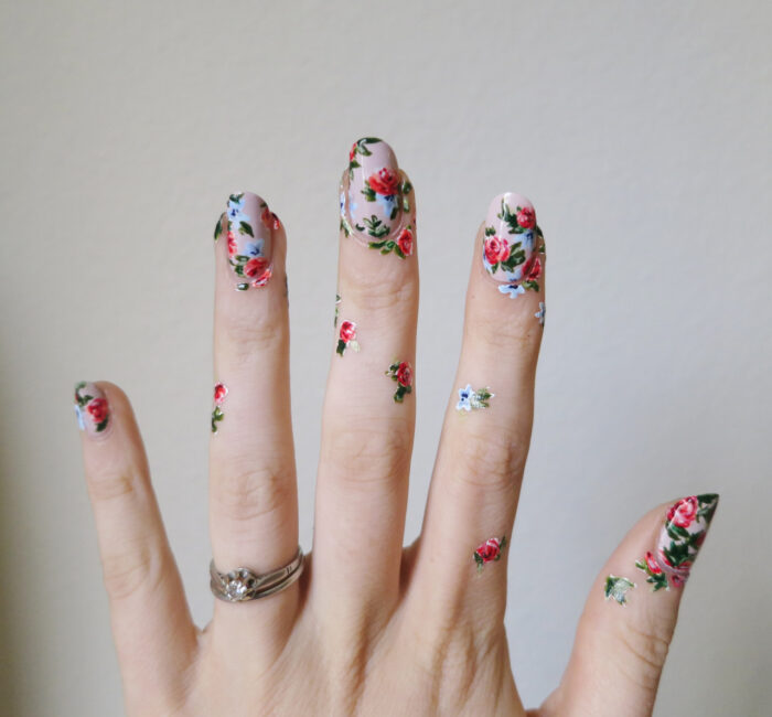 Floral nail art and finger tattoos