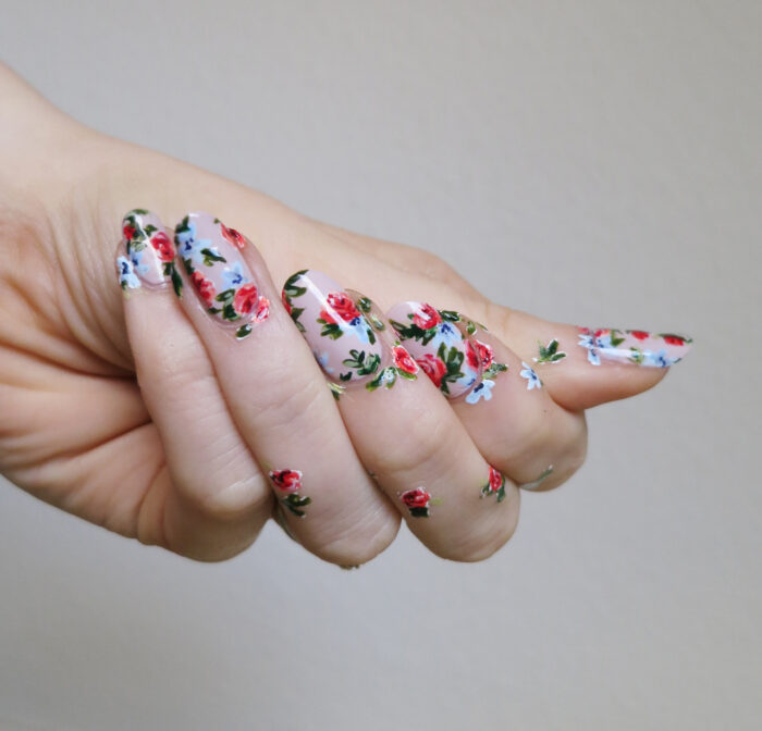 floral nail art and flower finger tattoos